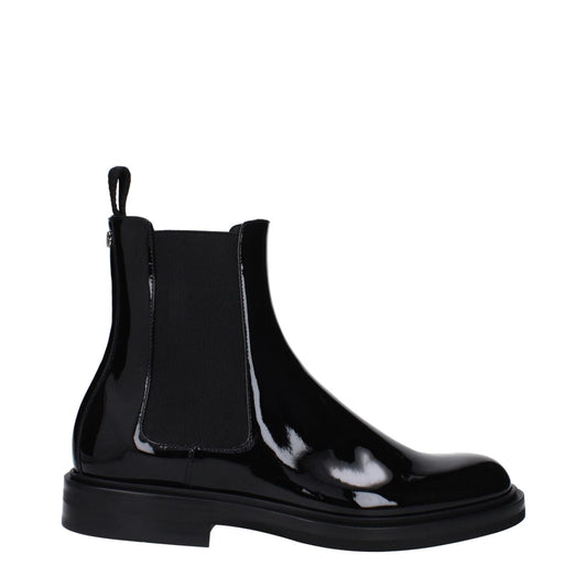 Dolce & Gabbana Black Leather Ankle Boots, patent leather design with back logo, rubber sole, stylish and sleek for modern fashion.