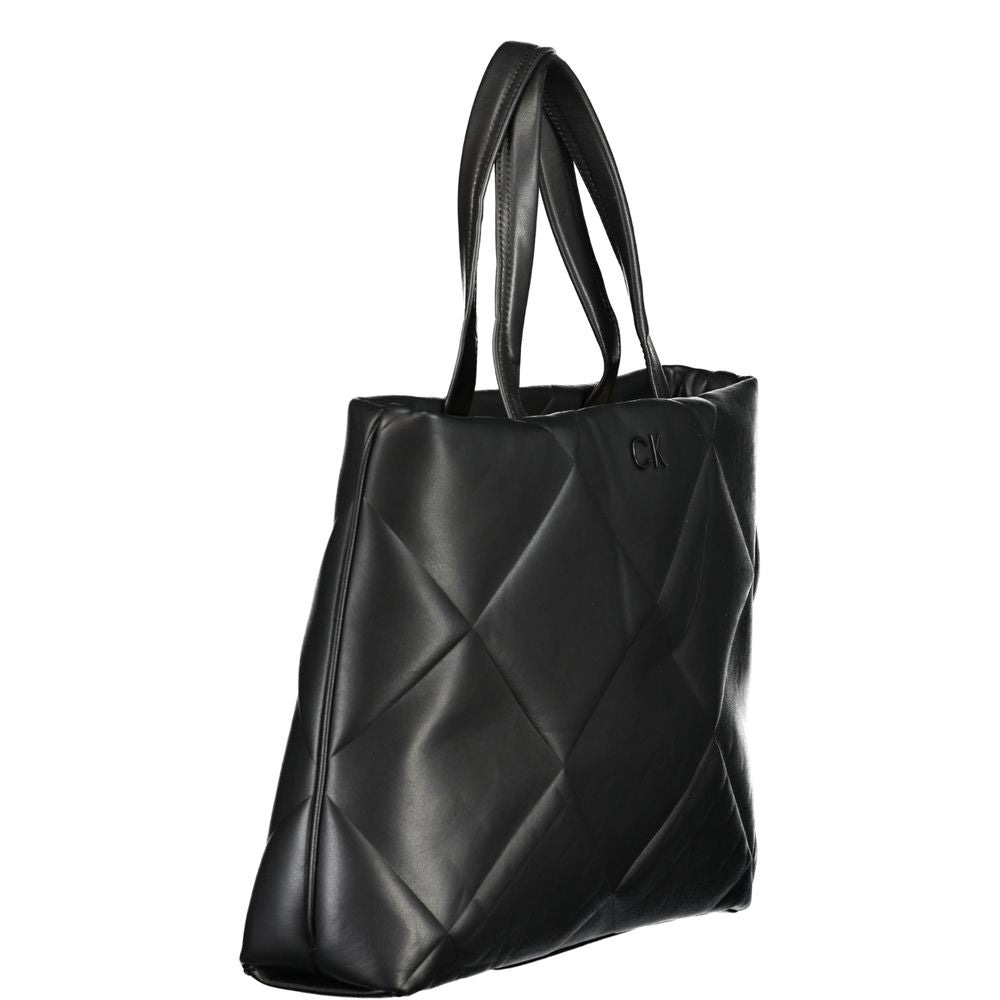 Calvin Klein Black Cotton Handbag with shoulder straps, internal pockets, drawstring closure, and logo.