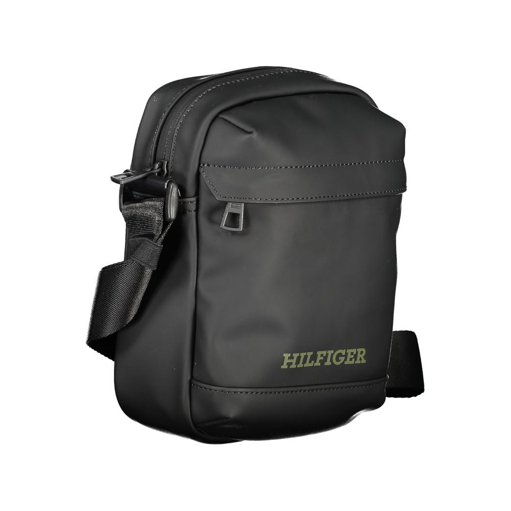 Tommy Hilfiger Black Polyethylene Shoulder Bag with adjustable strap and logo, featuring external and internal pockets, and zip closure.