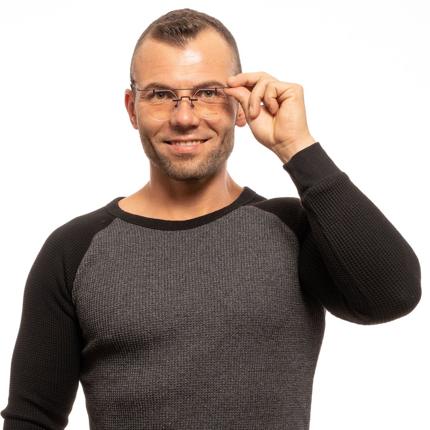 Man wearing Yohji Yamamoto Black Metal Glasses (Frames) with demo lenses and black frames for men, featuring bottom-rim style and metal frame.