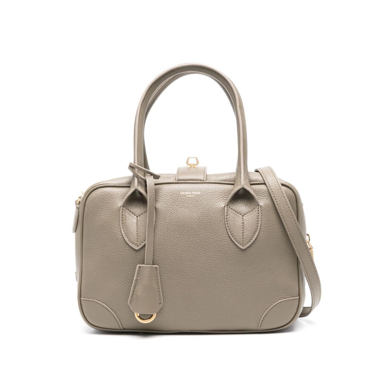 Front view with bag zipped and handles upright.