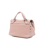Zanellato Postina Daily Baby leather handbag in rose pink calf leather with stud embellishments and detachable shoulder strap.