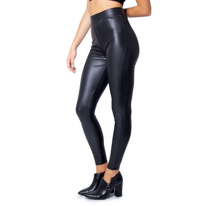 Woman wearing Only Black Polyester Leggings with a glossy finish, perfect for casual and elegant occasions.