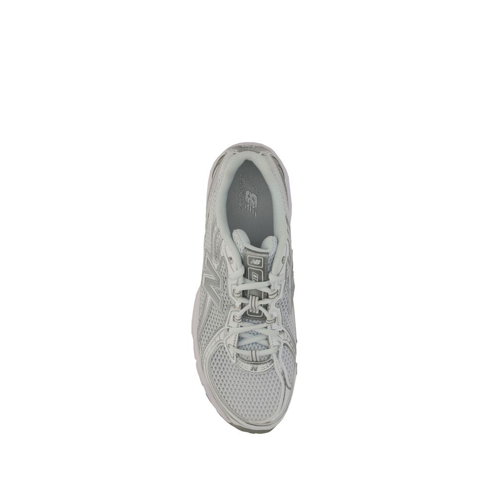 Top view of New Balance White Polyurethane Athletic Sneakers with mesh details and lace-up closure.