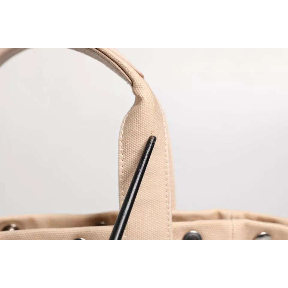 Front view with bag zipped and handles upright.