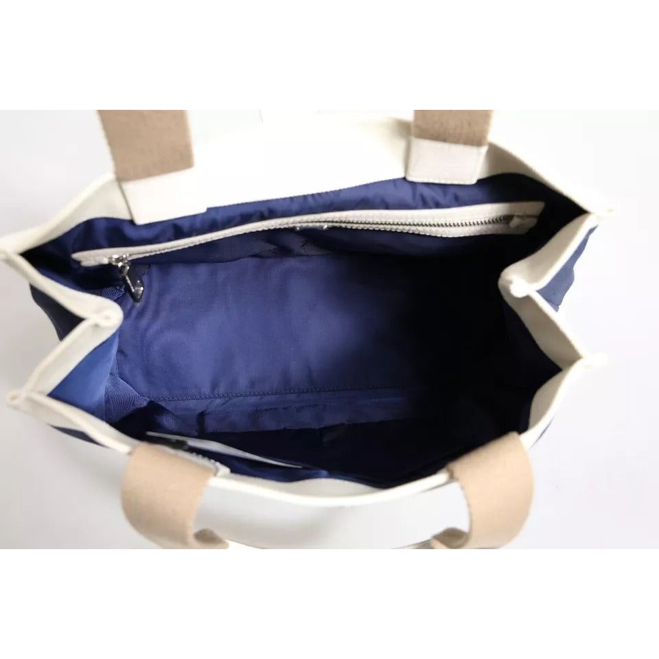 Front view with bag zipped and handles upright.