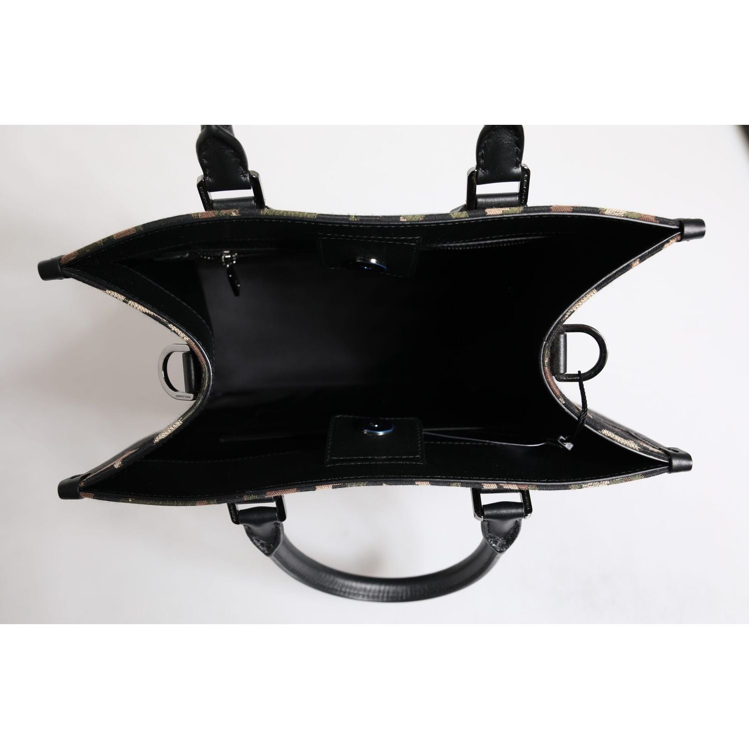 Front view with bag zipped and handles upright.