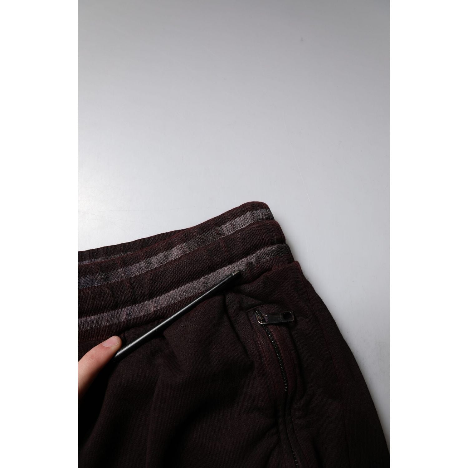 Front view with bag zipped and handles upright.