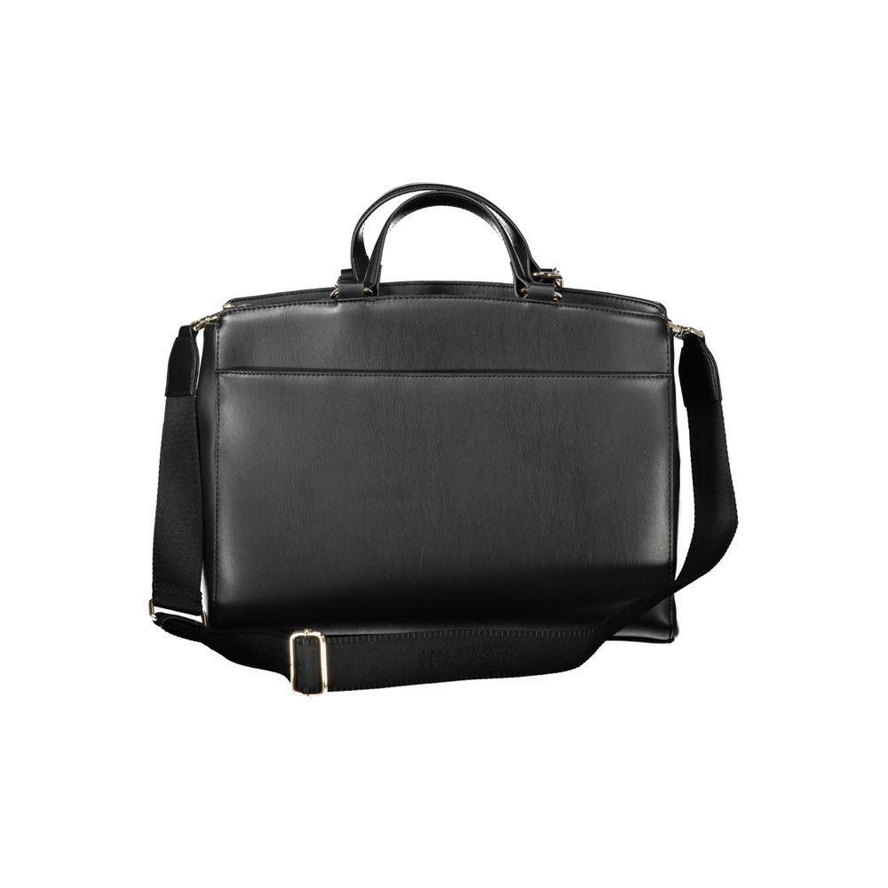 Front view with bag zipped and handles upright.