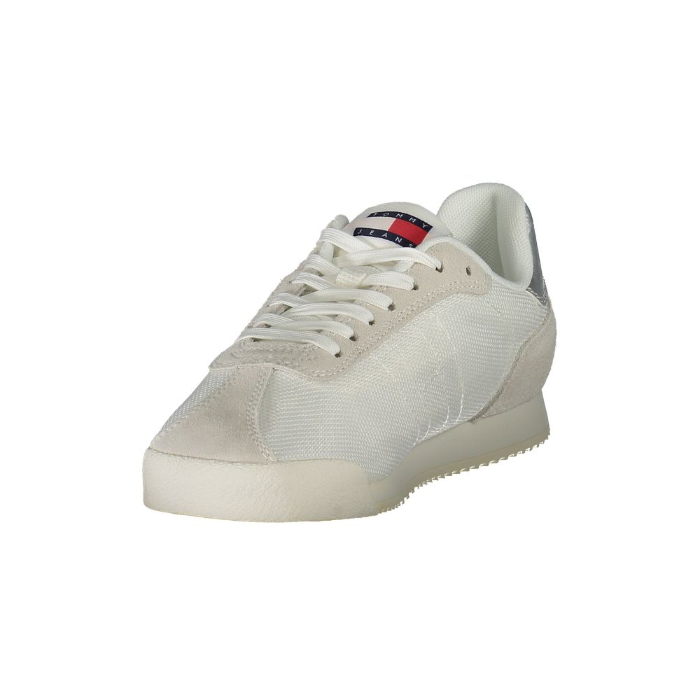 Tommy Hilfiger White Polyester Women Sneaker with lace-up design and recycled materials, showcasing sporty style and sustainable fashion.