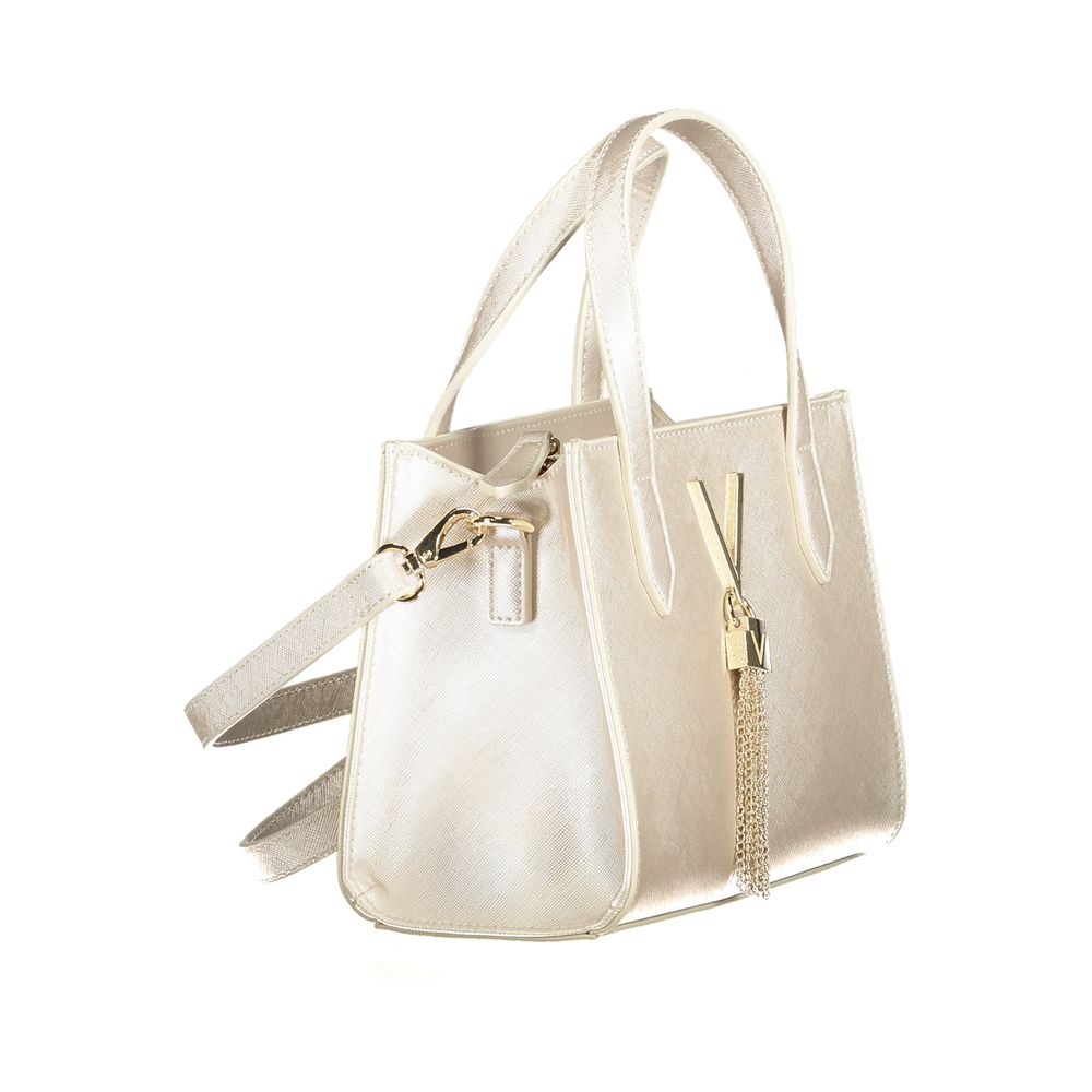 Elegant beige handbag with dual handles and a detachable shoulder strap, featuring a stylish metallic charm.