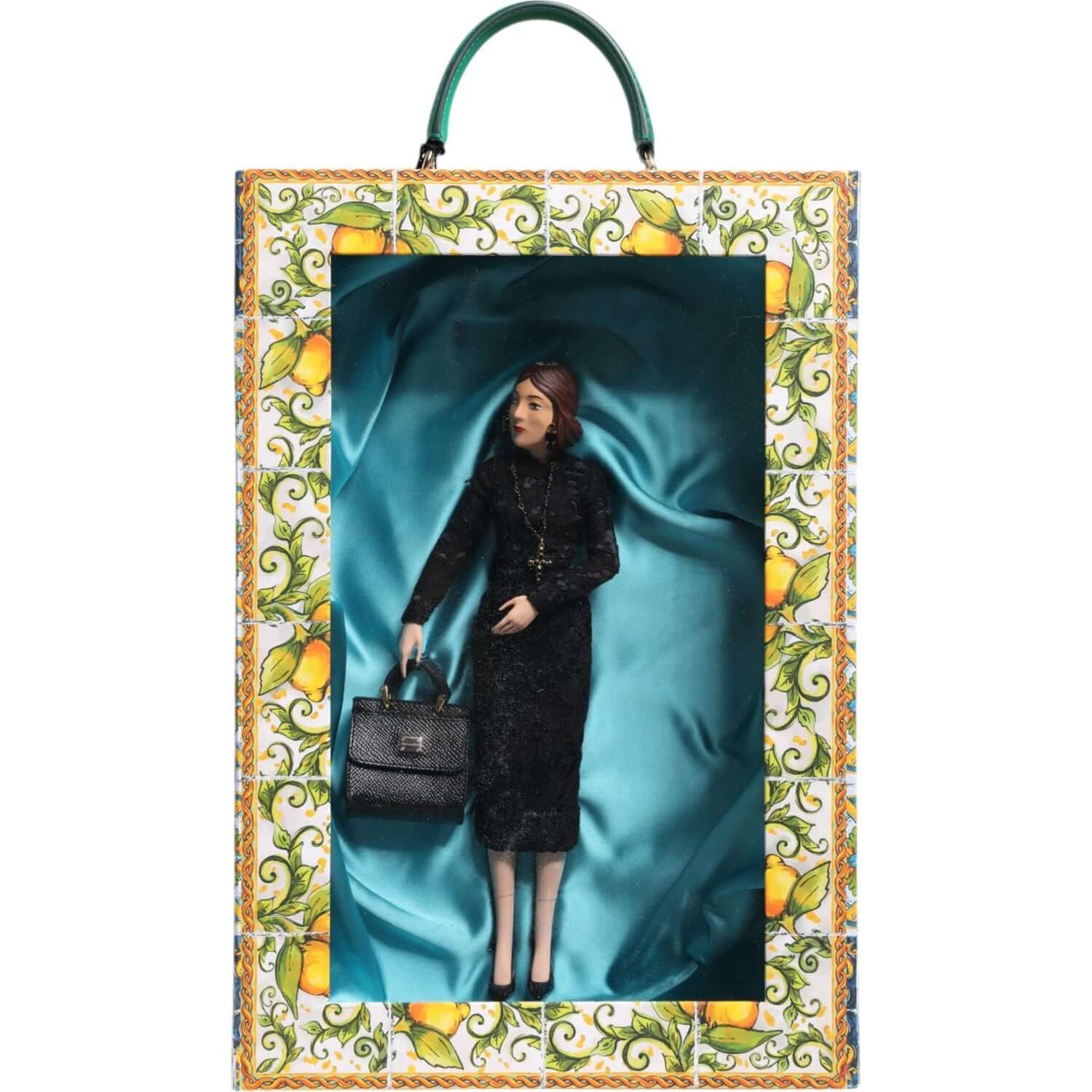 Front view with bag zipped and handles upright.