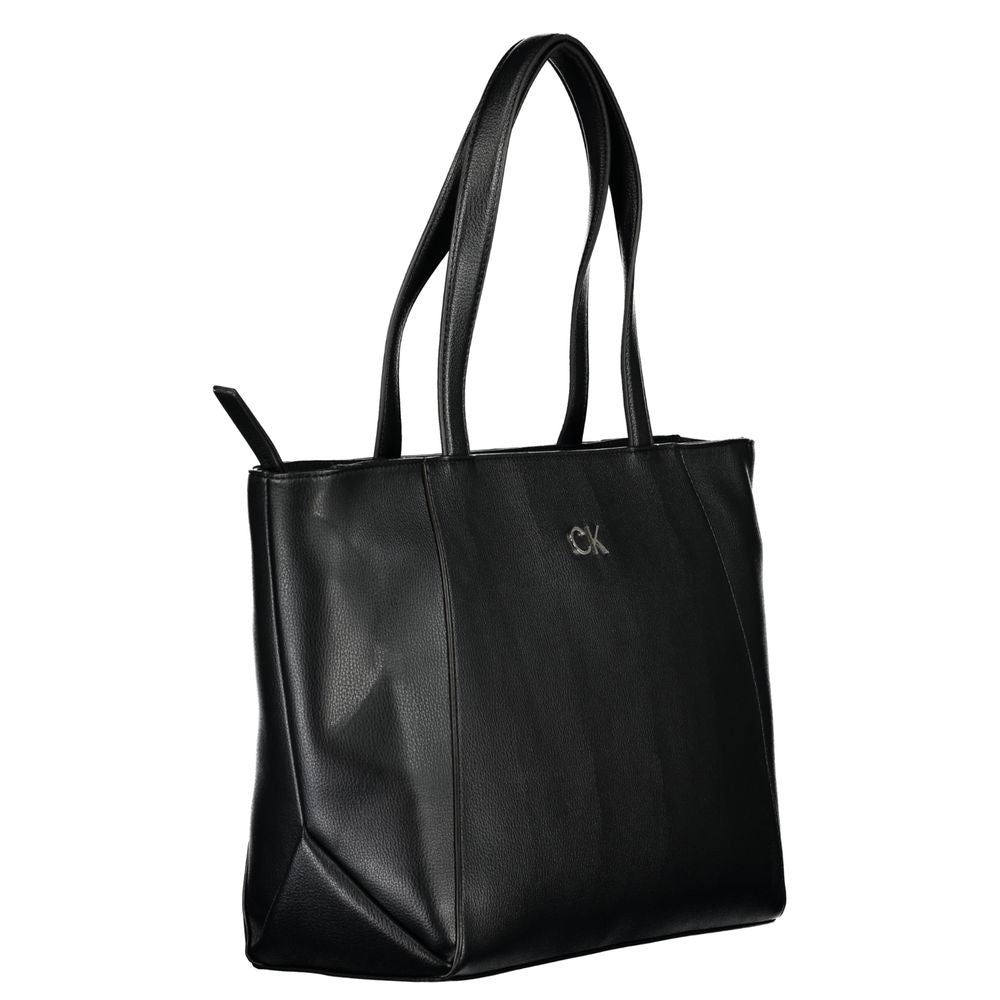 Front view with bag zipped and handles upright.