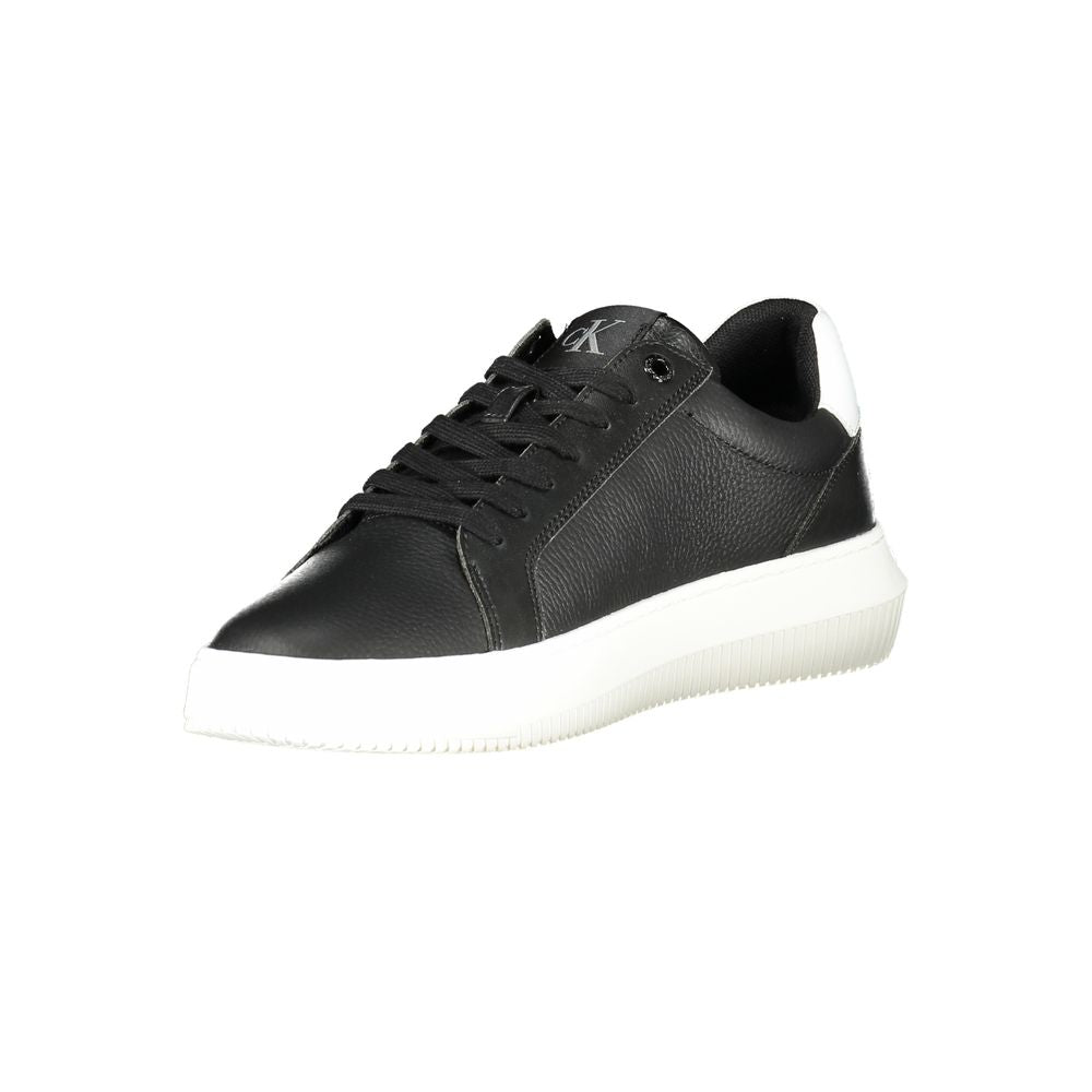 Calvin Klein Black Leather Men Sneaker with white sole and logo detail, perfect for casual or night outings, offering comfort and style.
