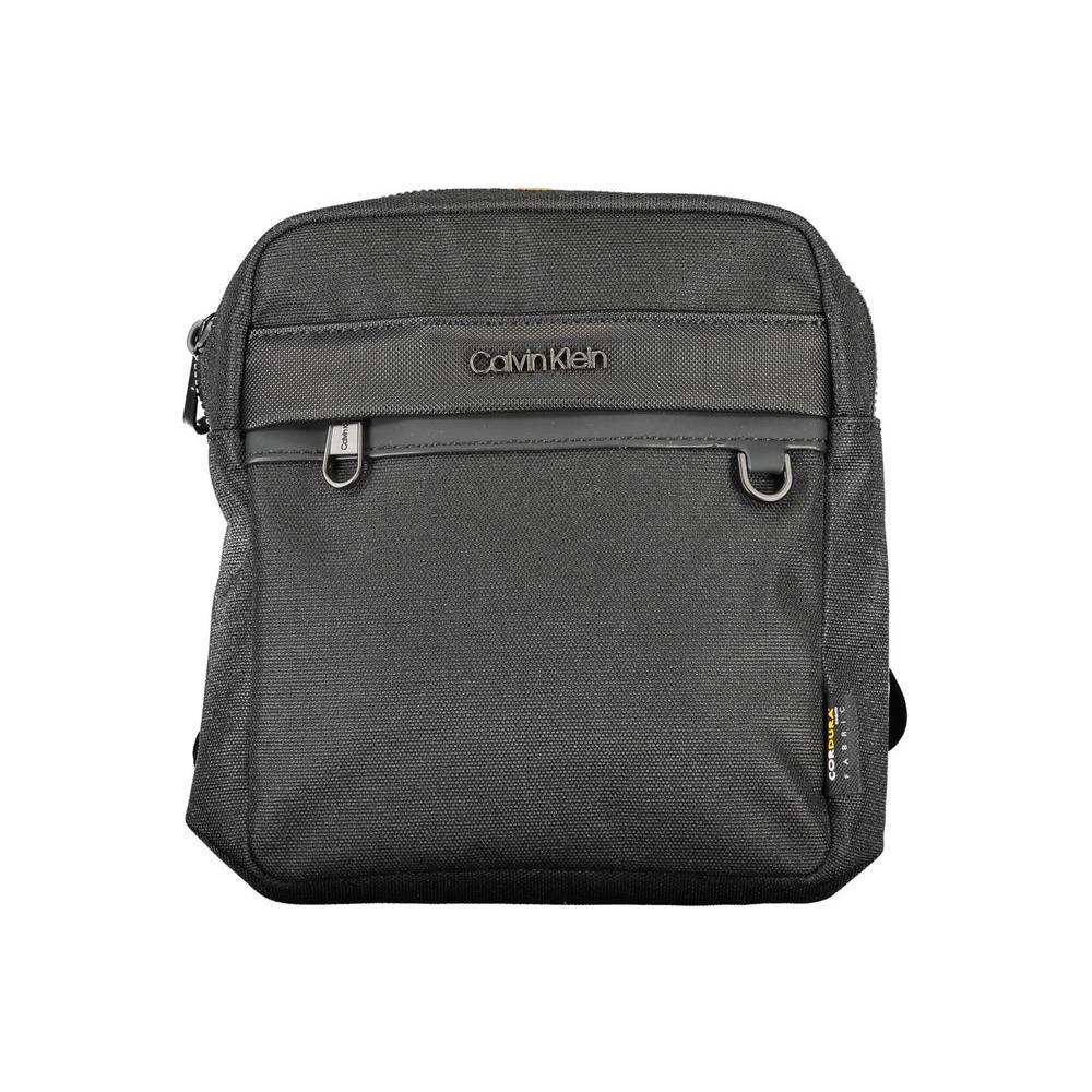 Front view with bag zipped and handles upright.