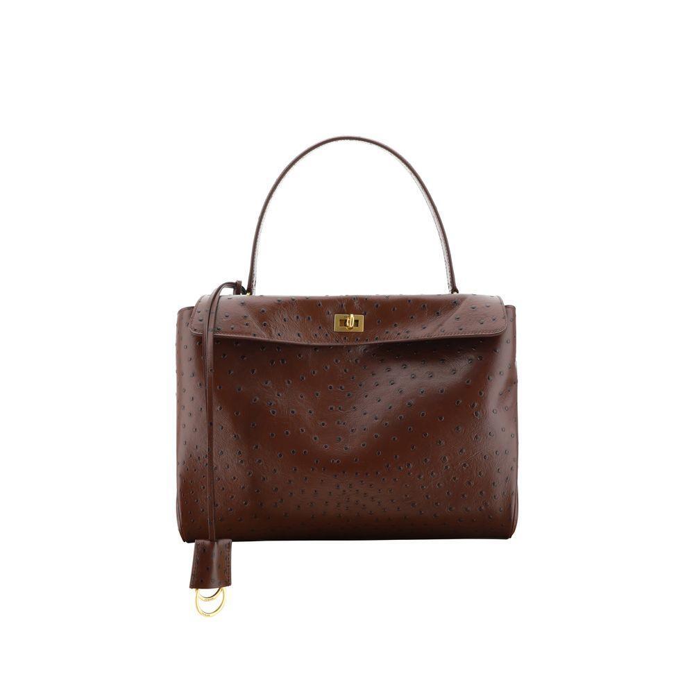 Front view with bag zipped and handles upright.
