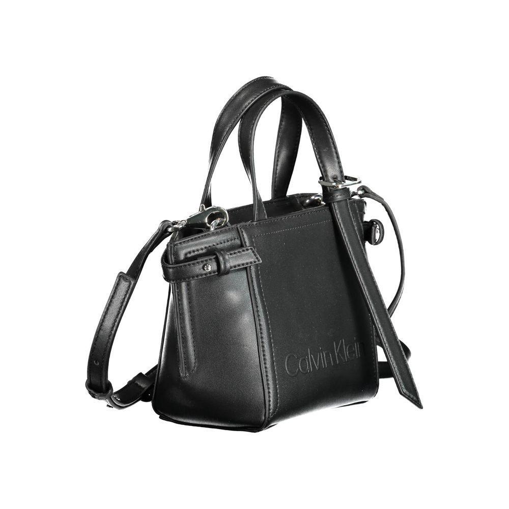 Front view with bag zipped and handles upright.