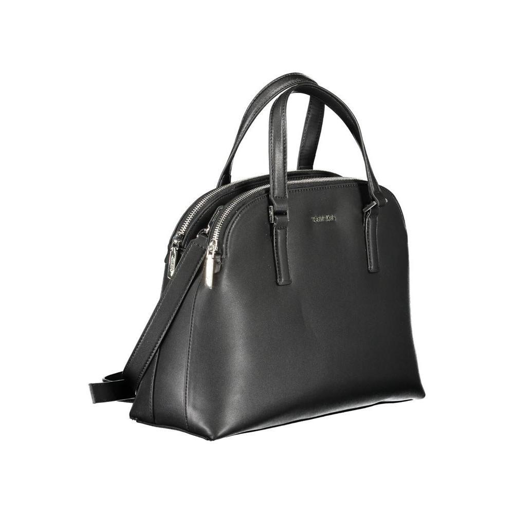 Front view with bag zipped and handles upright.