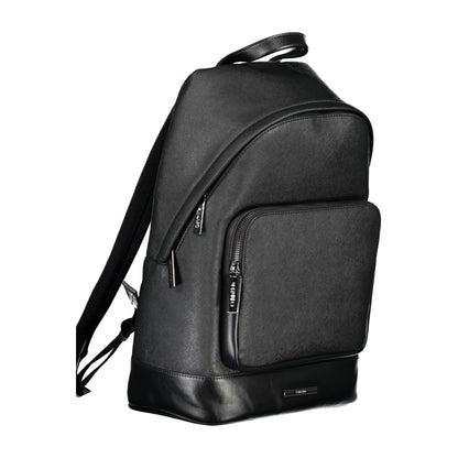 Calvin Klein Black Polyester Backpack with adjustable straps, external pocket, laptop compartment, contrasting details, and logo.