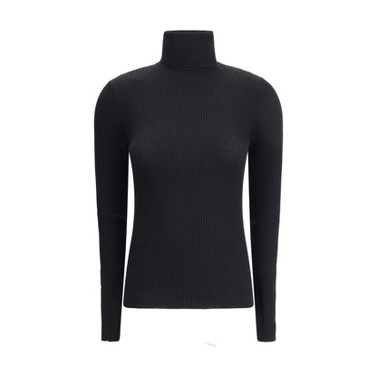 Wolford Black Fleece Wool Turtleneck with long sleeves, ribbed texture, and slim fit.