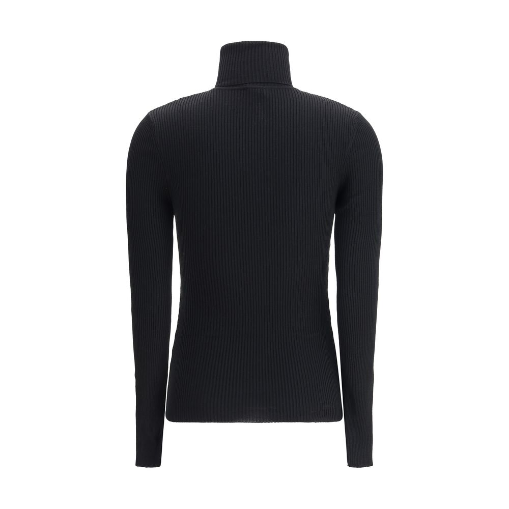 Back view of Wolford Black Fleece Wool Turtleneck, featuring ribbed design and slim fit, made from 100% virgin wool in Italy for AW25.