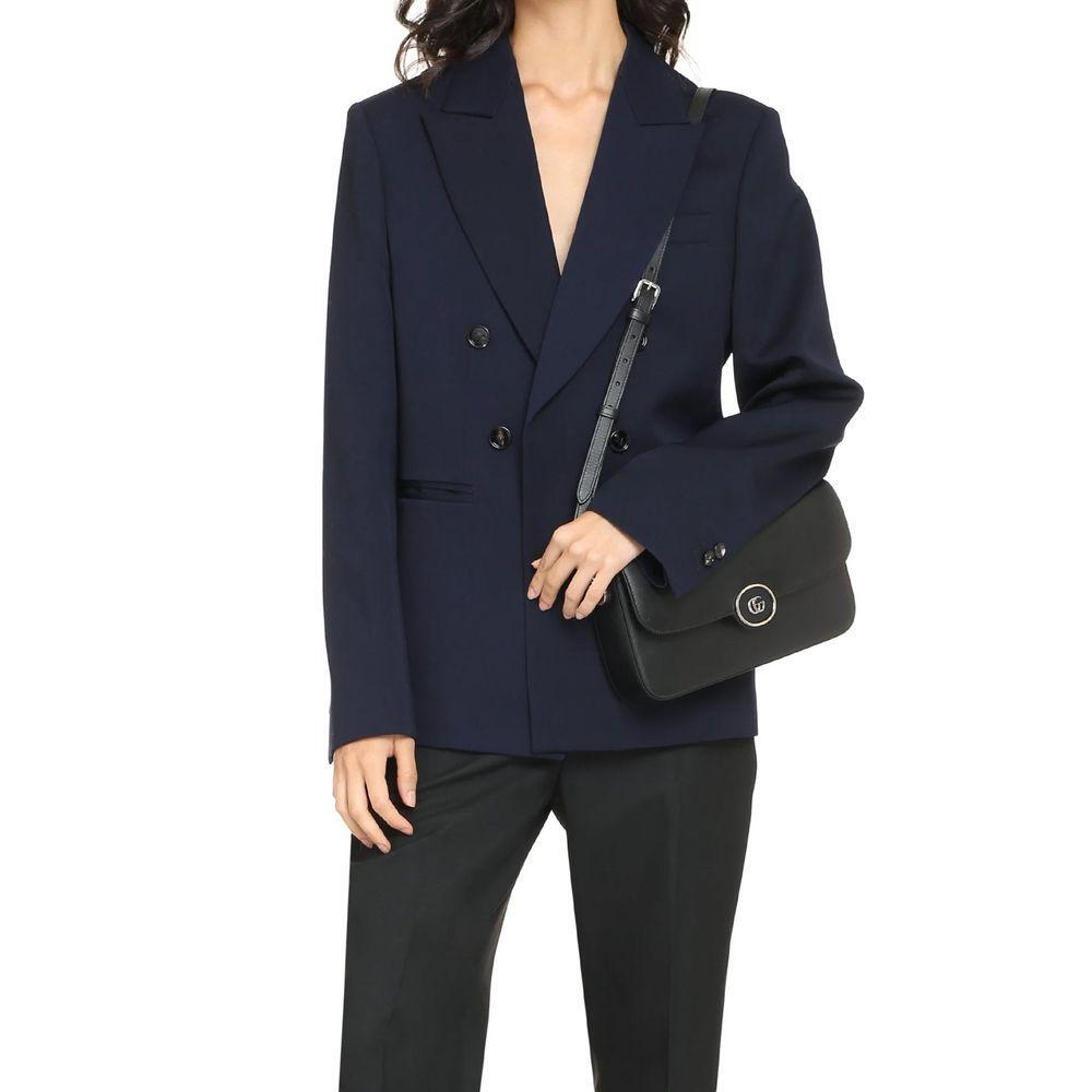 Front view with bag zipped and handles upright.