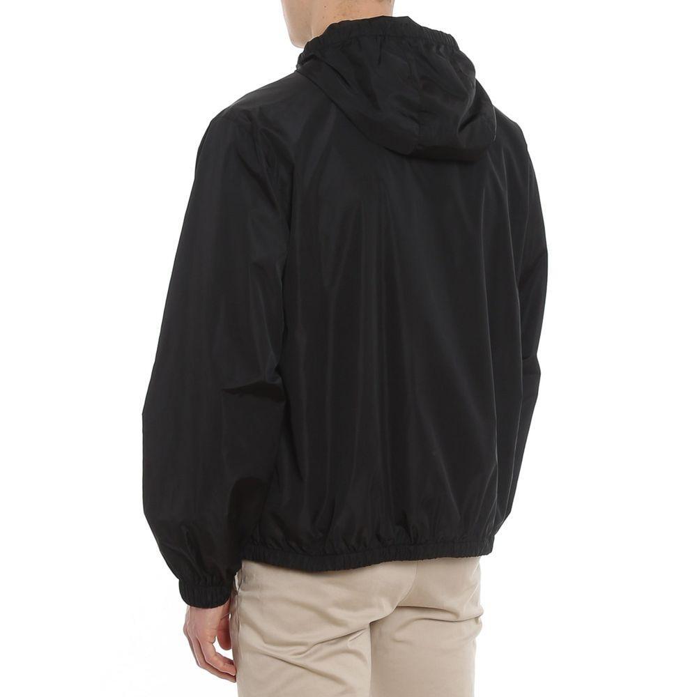 Front view with bag zipped and handles upright.