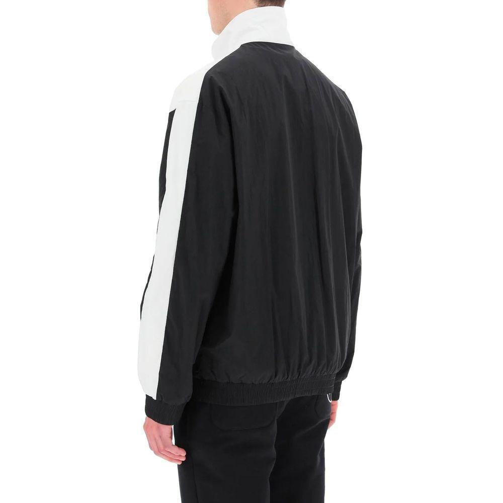 Front view with bag zipped and handles upright.