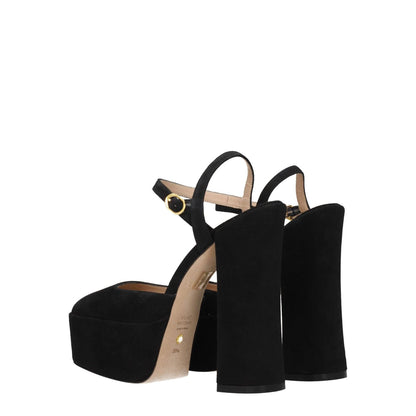 Stuart Weitzman Black Leather Platform Sandals with high heel and buckle closure, featuring suede material and leather sole, seen from back.