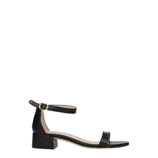 Stuart Weitzman Black Leather Flat Sandals with buckle closure, mid heels, and open toe design, crafted from high-quality leather.