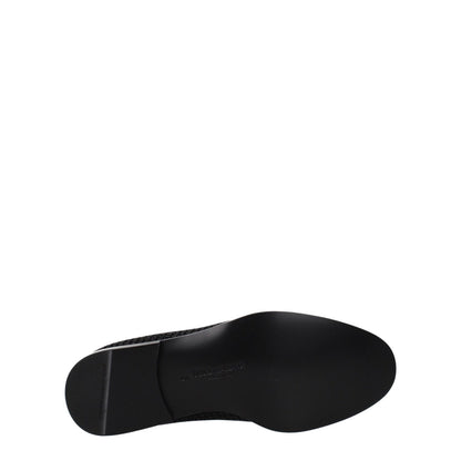 Sole view of Dolce & Gabbana Black Velvet Slip-On Loafers showing leather sole and round toe design.