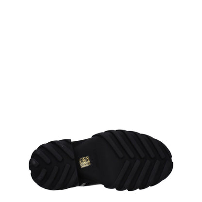 Sole view of Off-White Black Leather Ankle Boots showing rubber outsole with logo