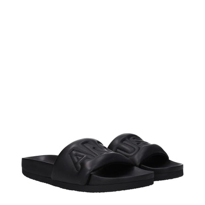 Ambush Black Leather Slippers with front logo, open toe design, rubber sole, and street style, MPN BMIC001LEA0011000.