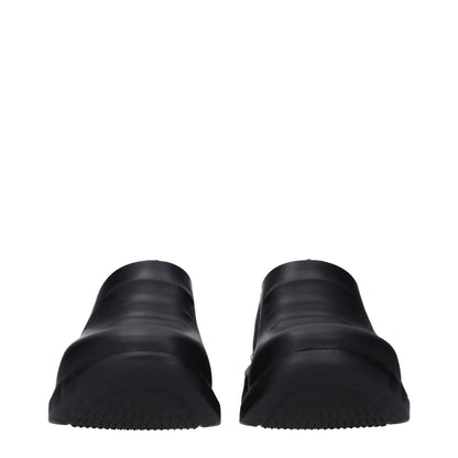 Front view of Givenchy Black Cotton Slippers with rubber sole and round toe design, displaying side and back logos, style BE305UE0Y9001.