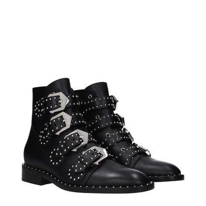 Givenchy Black Leather Ankle Boots with buckle closure and studs, featuring a round toe and low flat heel.