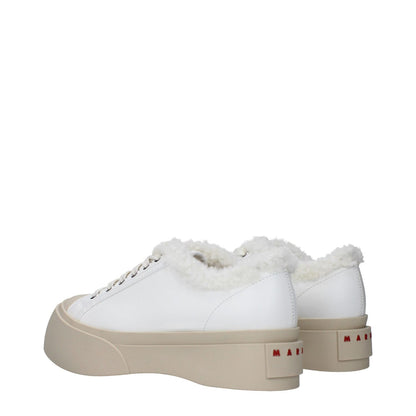 Marni White Leather Low Top Sneakers with fur detail, featuring front and back logos, round toe, and lace-up closure, rubber sole.