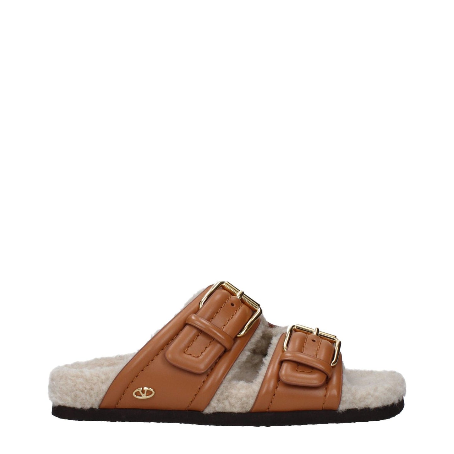 Side view of Valentino Garavani Brown Leather Slippers with buckle closure, open toe design, and rubber sole for casual wear.