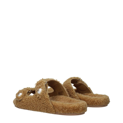 Jimmy Choo Brown Fabric Slippers with rubber sole, open toe, and strap closure, featuring side detail and logo.