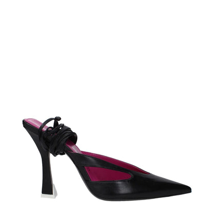 The Attico Black Leather Stiletto Heel Sandals with lace-up closure, pointy toe, and high heel design on display