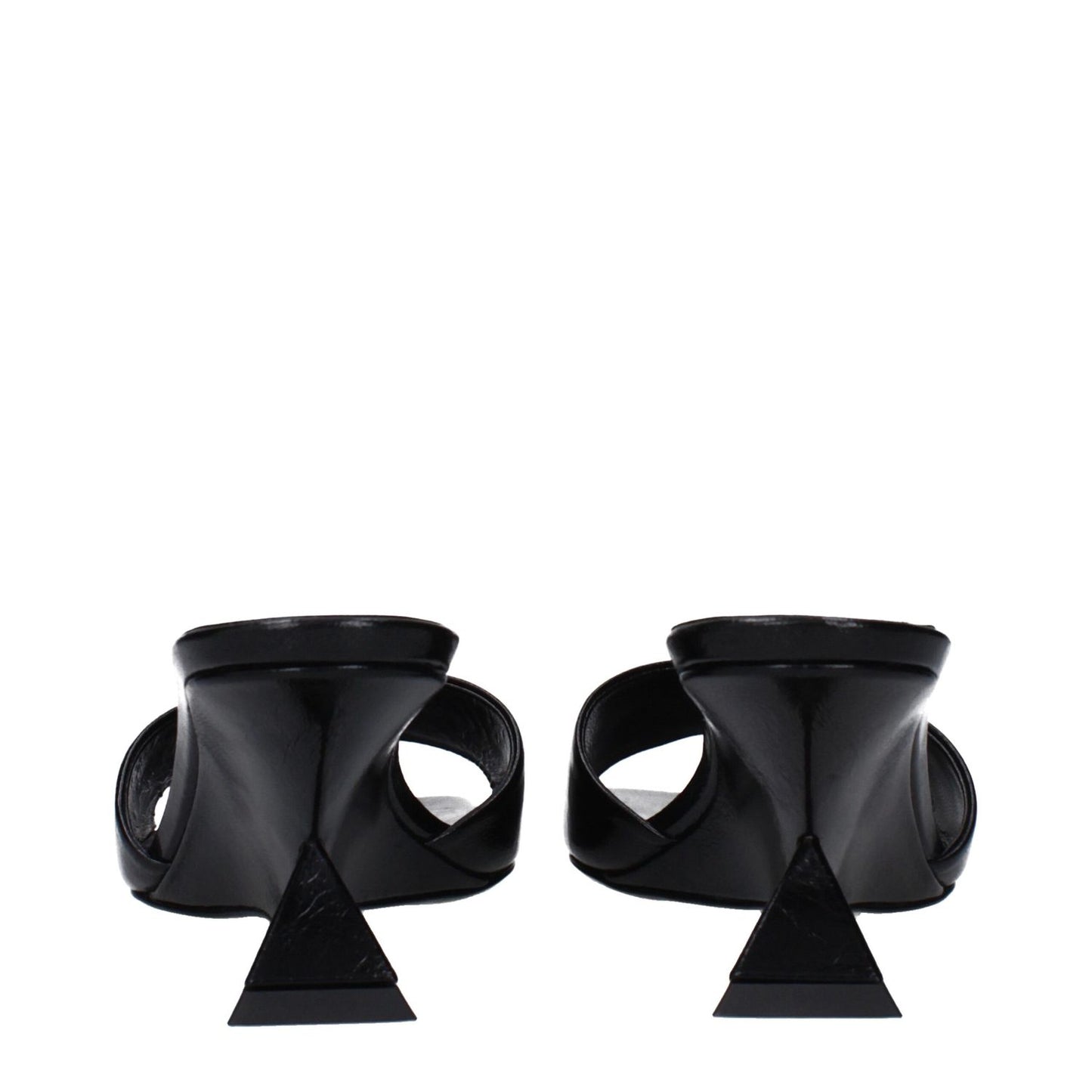 Back view of The Attico Black Leather Sandals with vintage and aged effect.