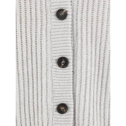 Close-up of Brunello Cucinelli White Cashmere Cardigan showing ribbed texture and contrasting buttons for elegance and comfort.
