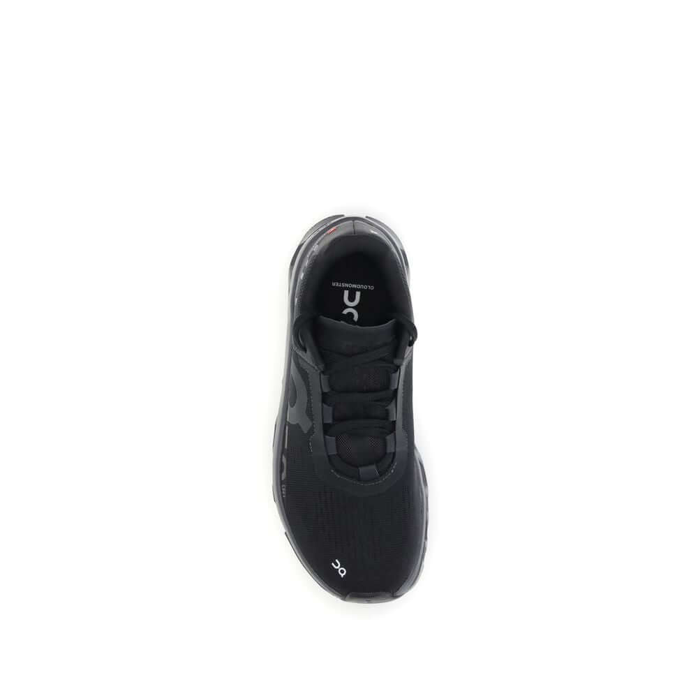 Top view of ON Black Polyester Athletic Sneakers showcasing upper lace-up design and brand logo on tongue.