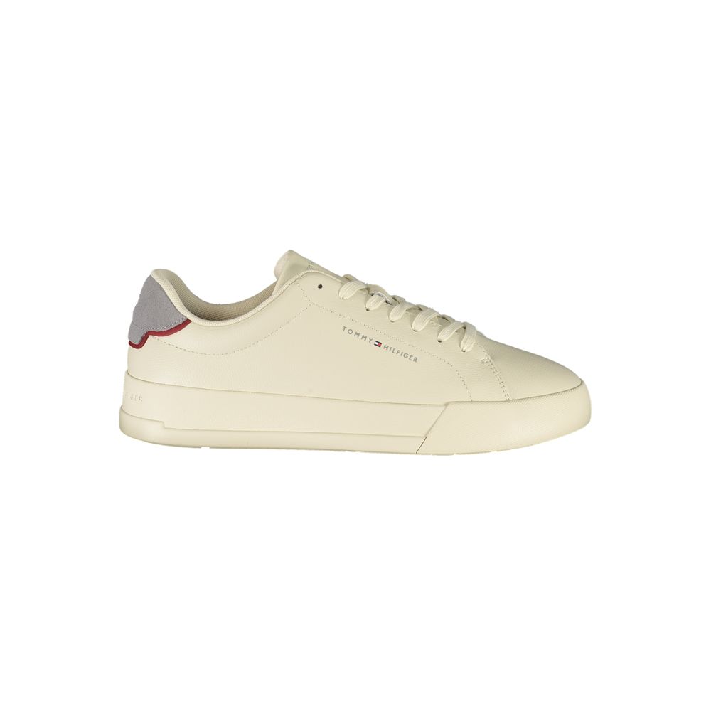 Tommy Hilfiger Beige Leather Men Sneaker with grey accents, showcasing a sporty yet sleek design and iconic logo on the side.