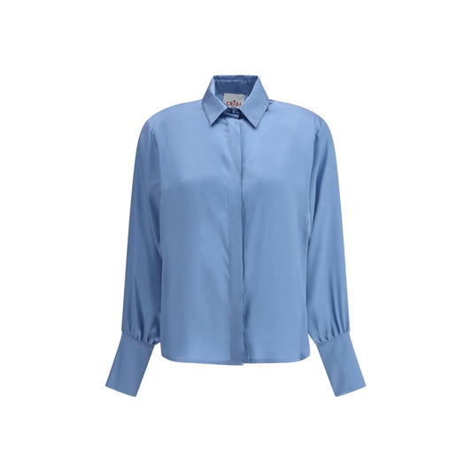 Crida Milano Light Blue Silk Shirt with high collar and luminous texture, showcasing minimalist elegance and sophisticated style.