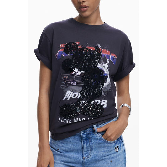 Alt Tag: Woman modeling Desigual Black Cotton Women T-Shirt with Mickey Mouse lace and sequin design, casual chic style.