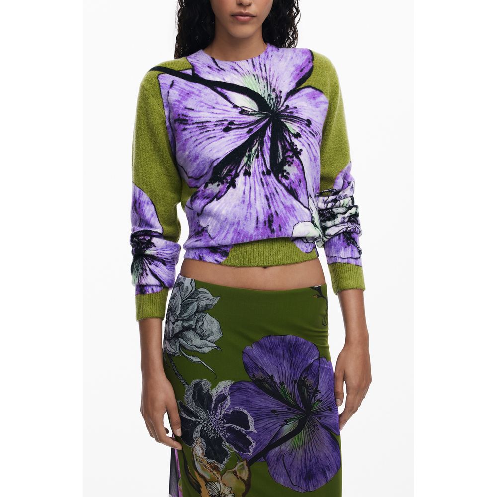 Model wearing Desigual Green Polyester Women Skirt with floral design, showcasing vibrant colors and style for bold fashion statements.