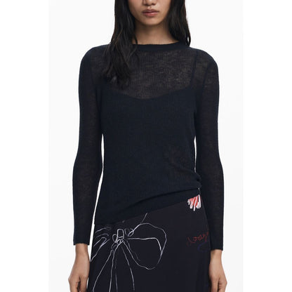 Desigual Black Polyester Women Dress with long sleeves and abstract skirt embellishments, model wearing the Kala Dress.