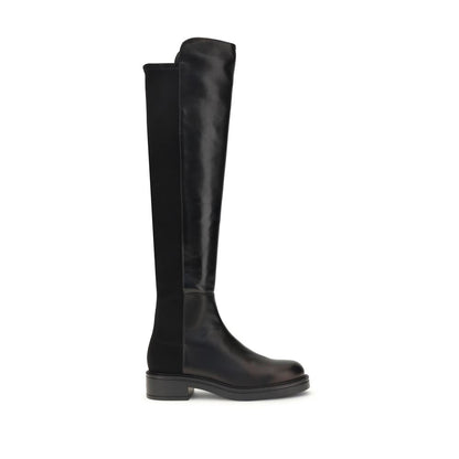 Stuart Weitzman Black Leather Over The Knee boots with smooth leather front and elastic back, showcasing a block heel for style and comfort.