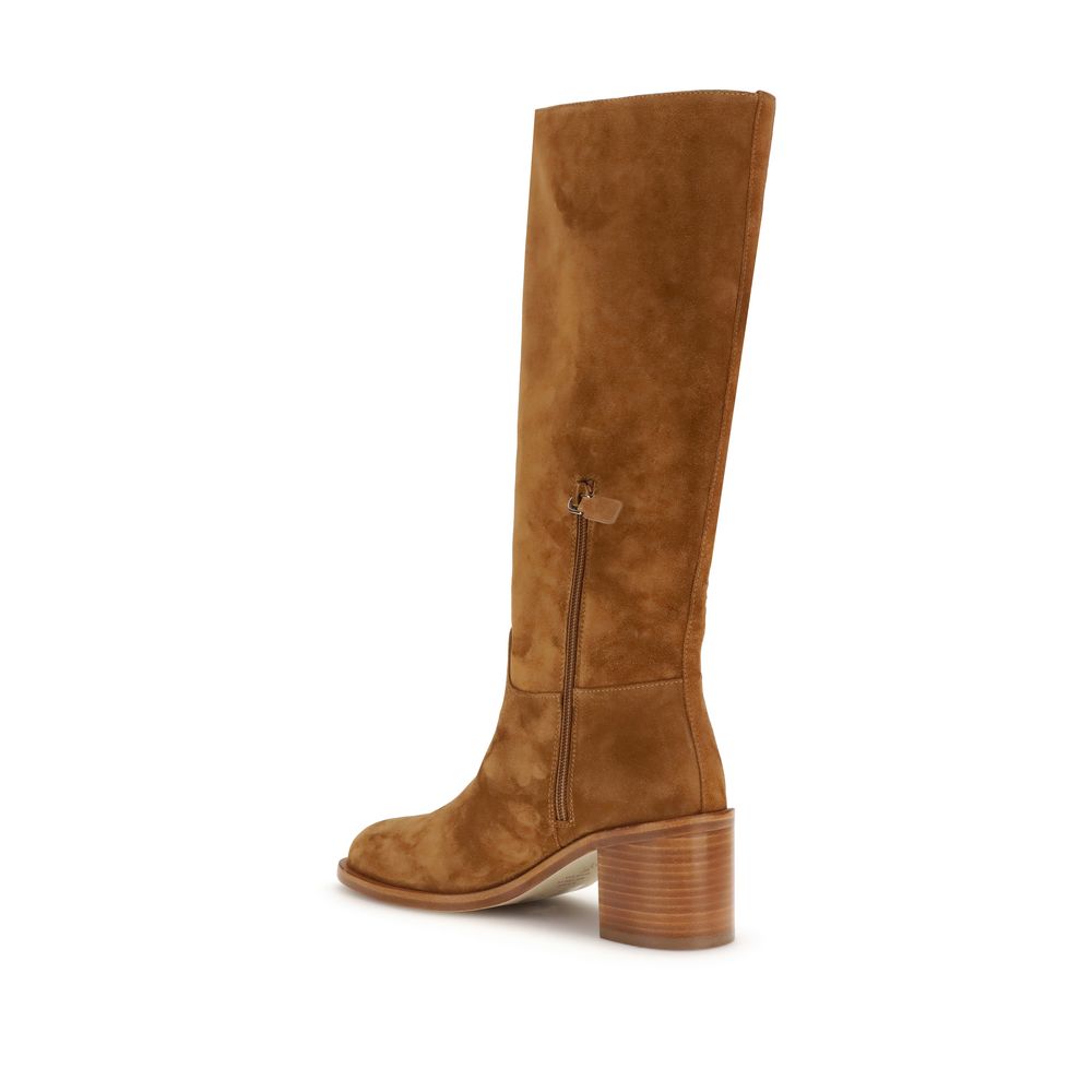 Side view of Stuart Weitzman Brown Calf Leather Bos Taurus Boots with block heel and round toe, showcasing knee-high suede design.