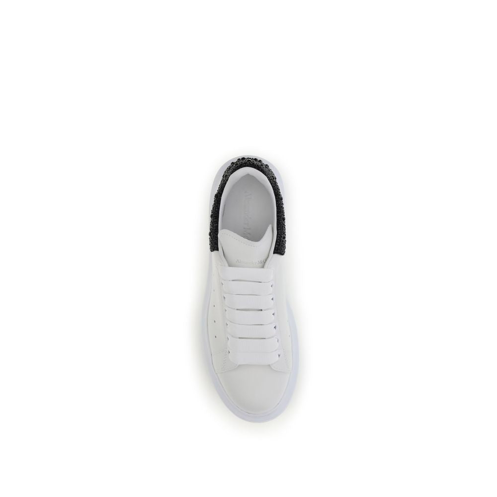 Top view of Alexander McQueen White Leather Chunky Sneakers with black crystal heel and thick rubber sole.